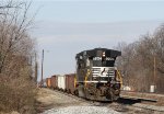 NS 9204 leads a work train out of the yard behind train 94Q